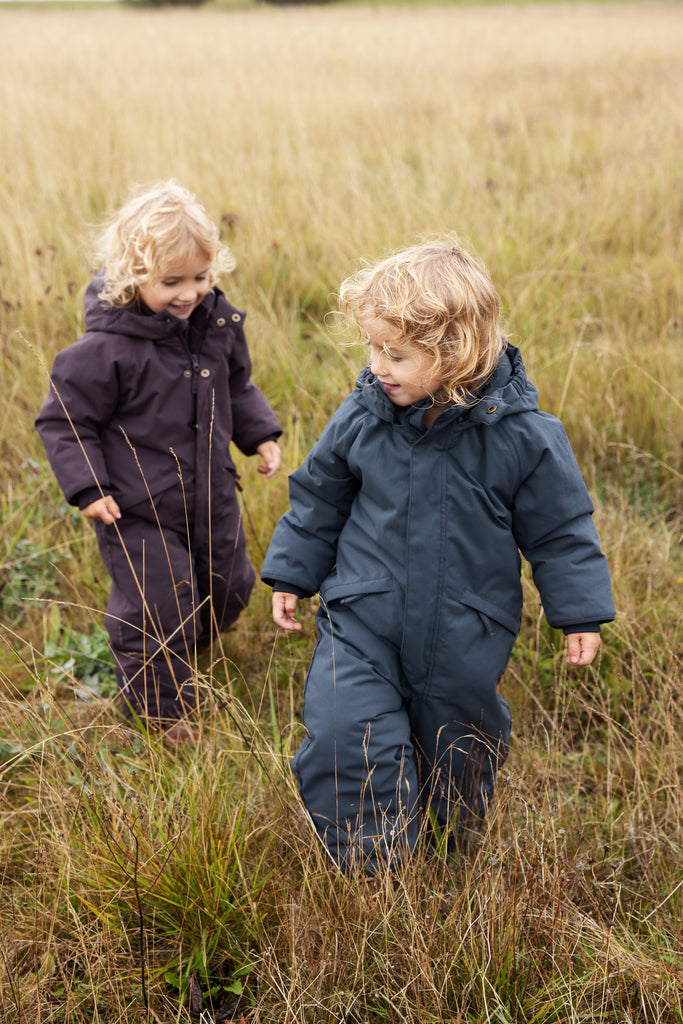 Ollie kavadrakt, Ink