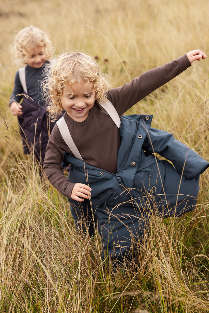 Ollie kavadrakt, Ink