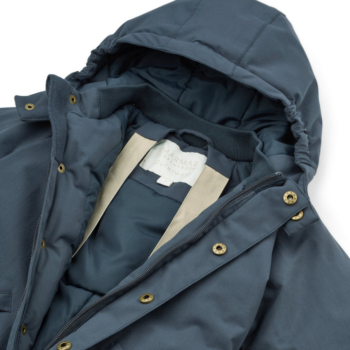 Ollie kavadrakt, Ink