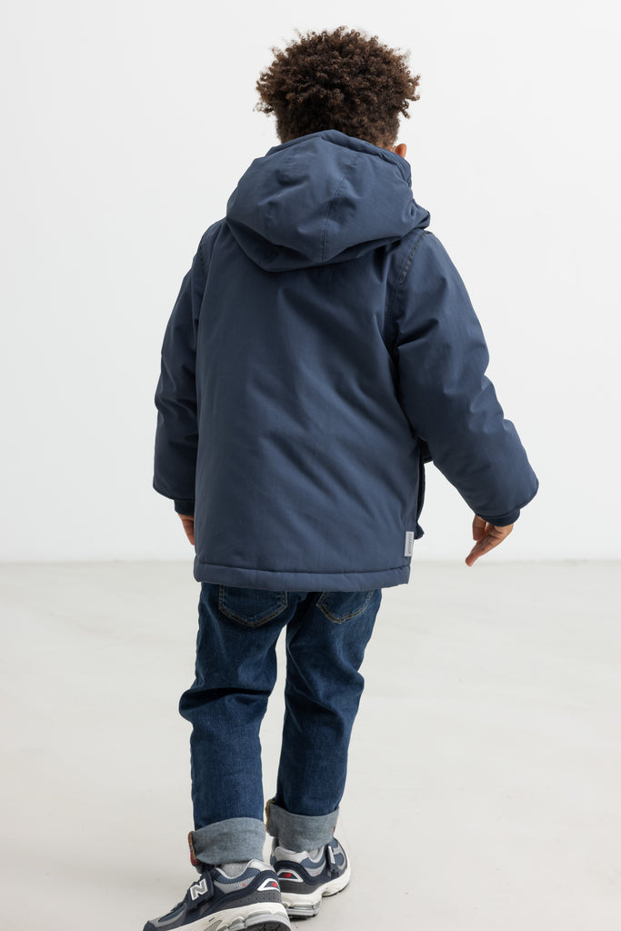 Omas vetrarjakki, Ink