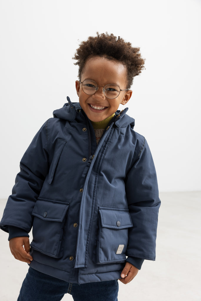 Omas vetrarjakki, Ink