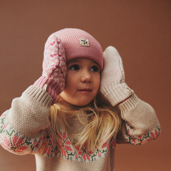 Haansi vøttir, Rose