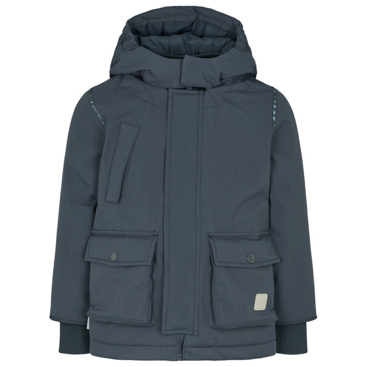 Omas vetrarjakki, Ink