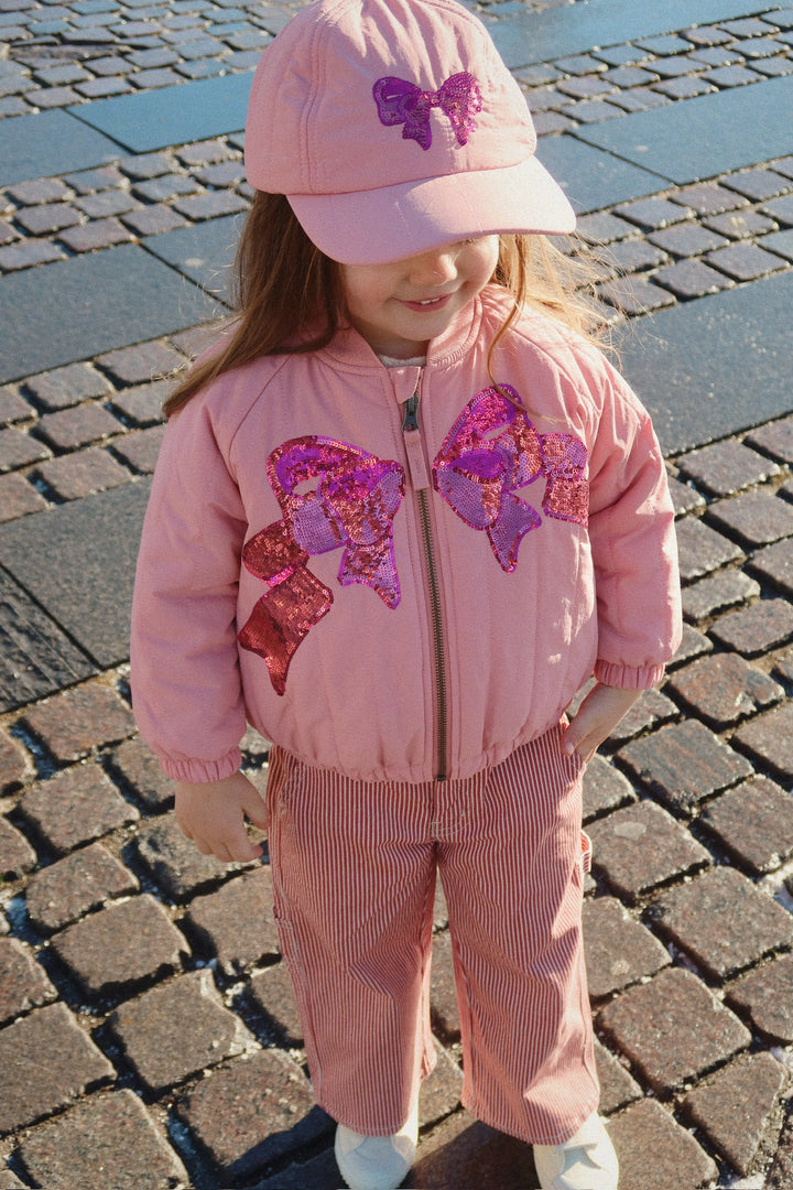 Luc buksur, Milk Rouge Stripe