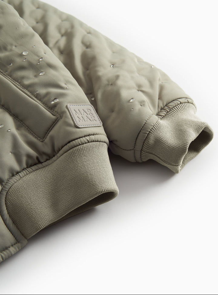 Oki termojakki, Olive Stone