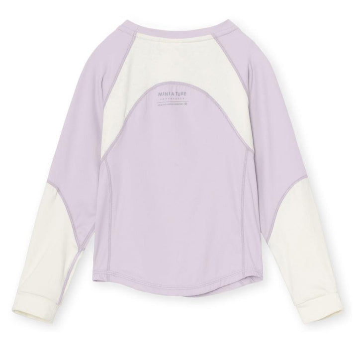 Lendi blusa, Thistle